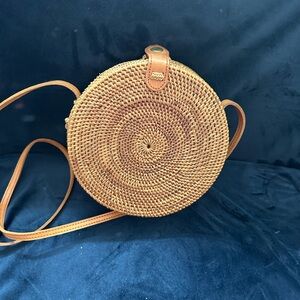 JULY SALE!! Like new round straw handbag. Barely used.
